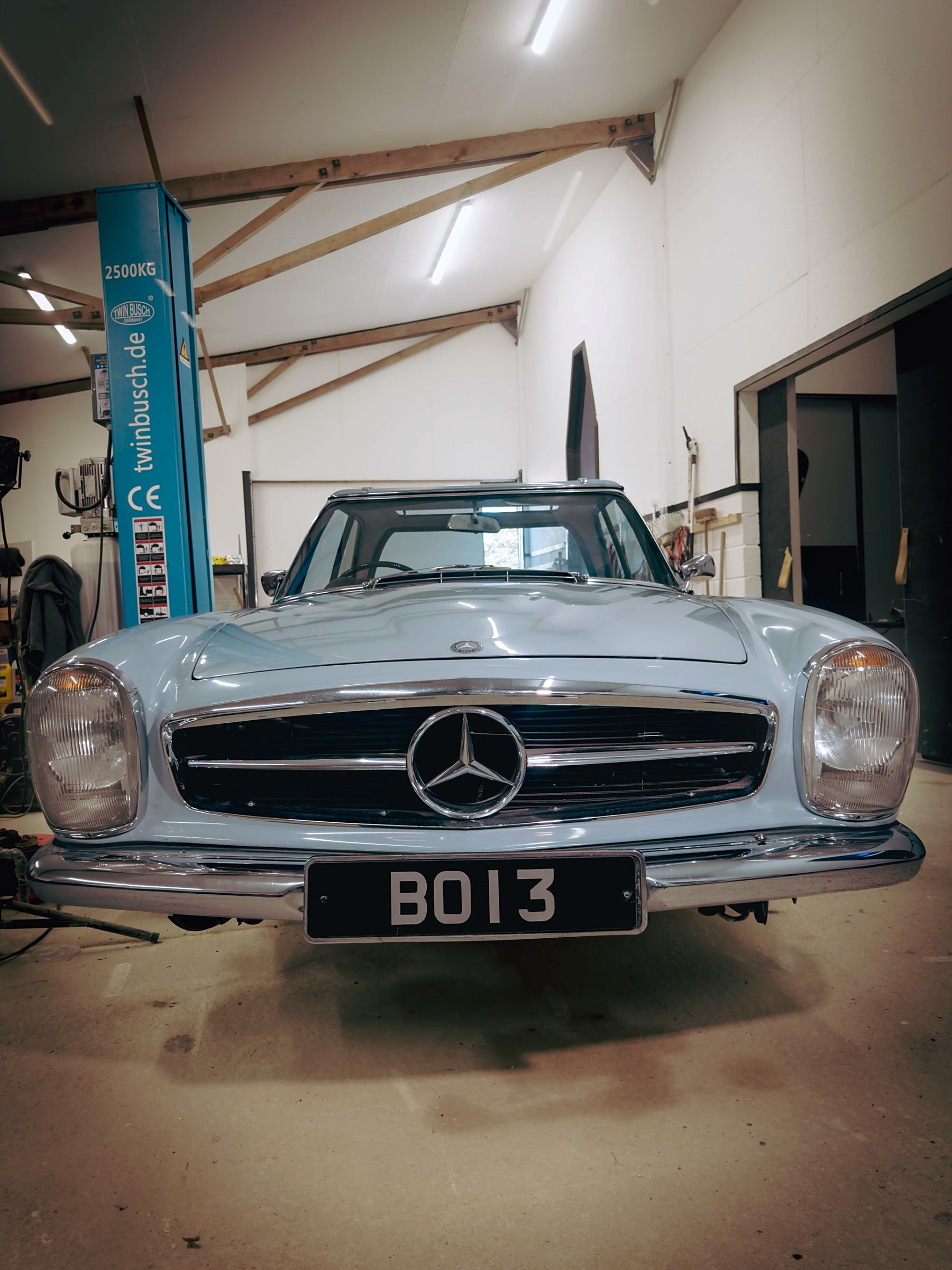 Front view of the pale blue Pagoda showing its grille and headlamps